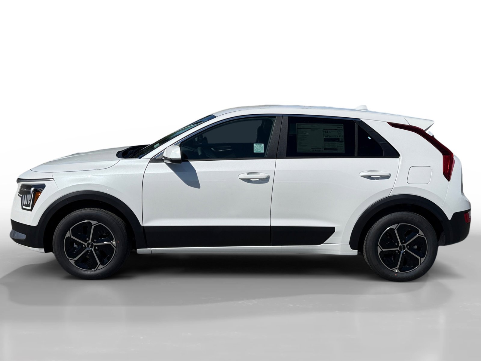 New 2026 Snow White Pearl Kia LX image 2