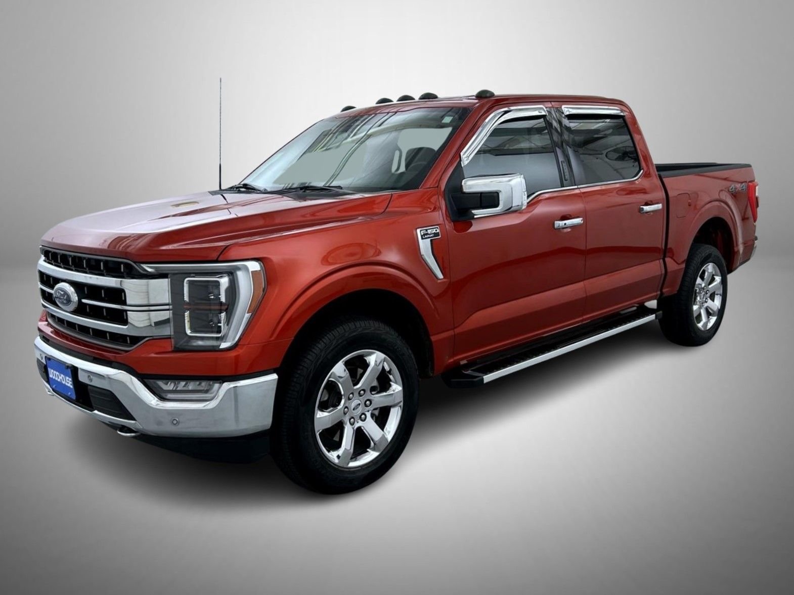 Used 2023 Maroon Ford Lariat image 1