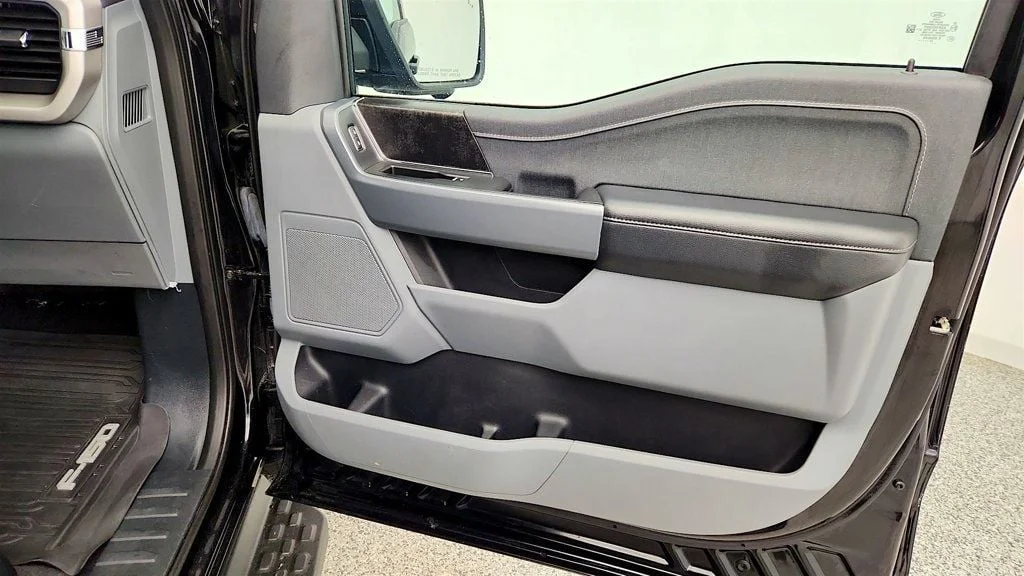 Used 2023 Agate Black Metallic Ford XLT 4WD SuperCrew 5.5