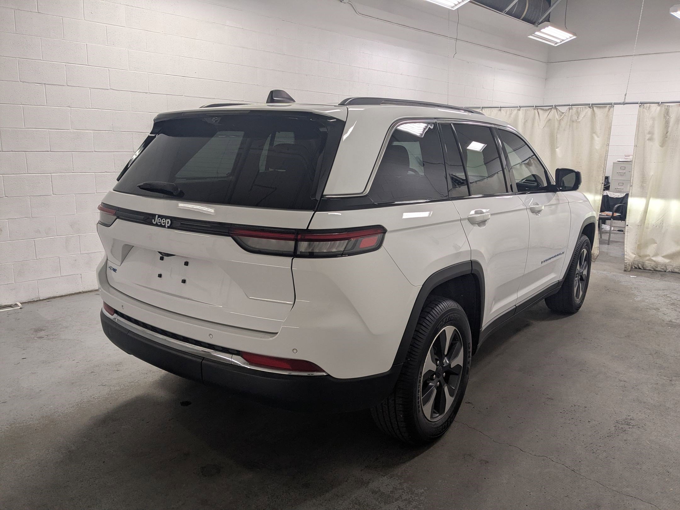 Used 2022 Bright White Clearcoat Jeep 4xe image 4