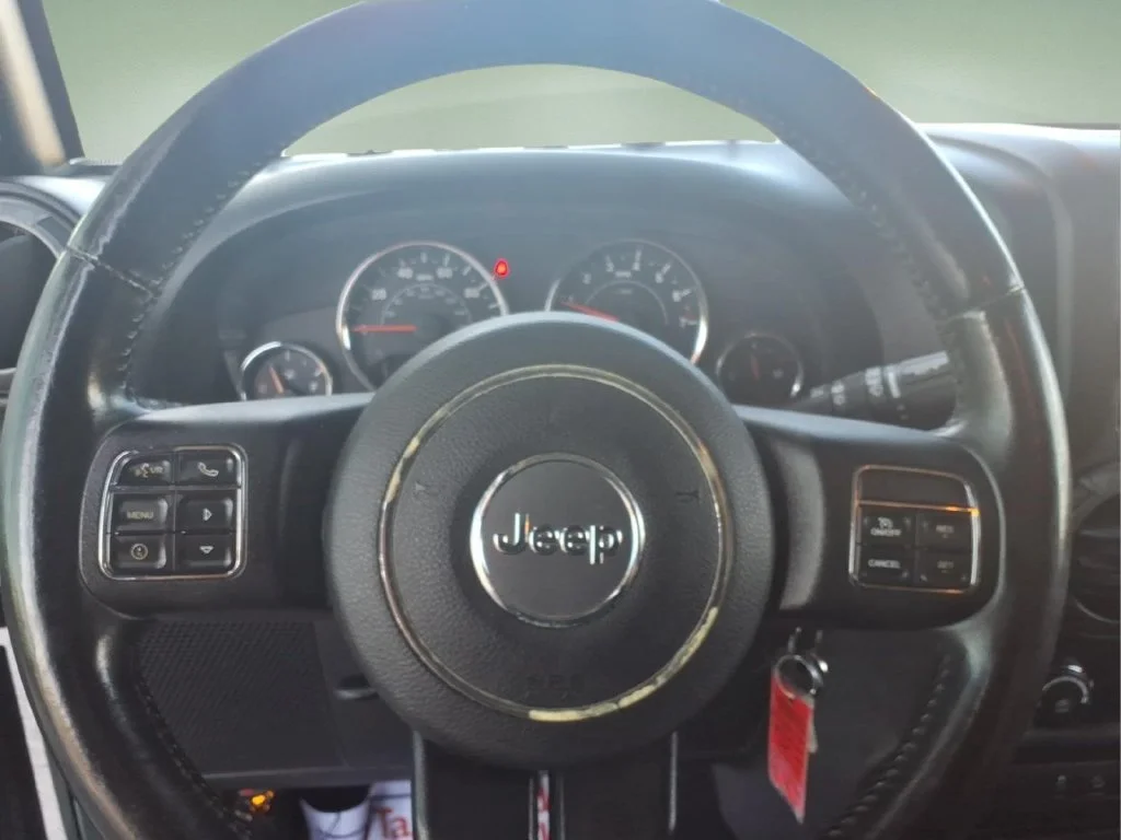 Used 2015 Gray Jeep Unlimited Sport image 25