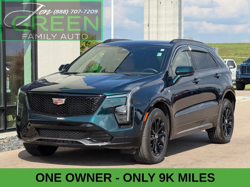 Used 2024 Green Cadillac Sport image 1