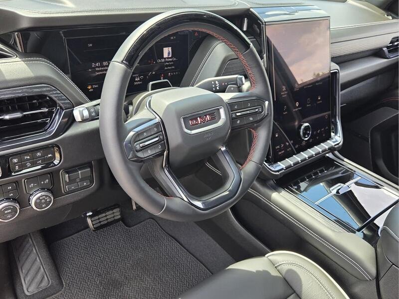 Used 2026 Volcanic Red GMC 4WD 4DR AT4 ULTIMATE image 11