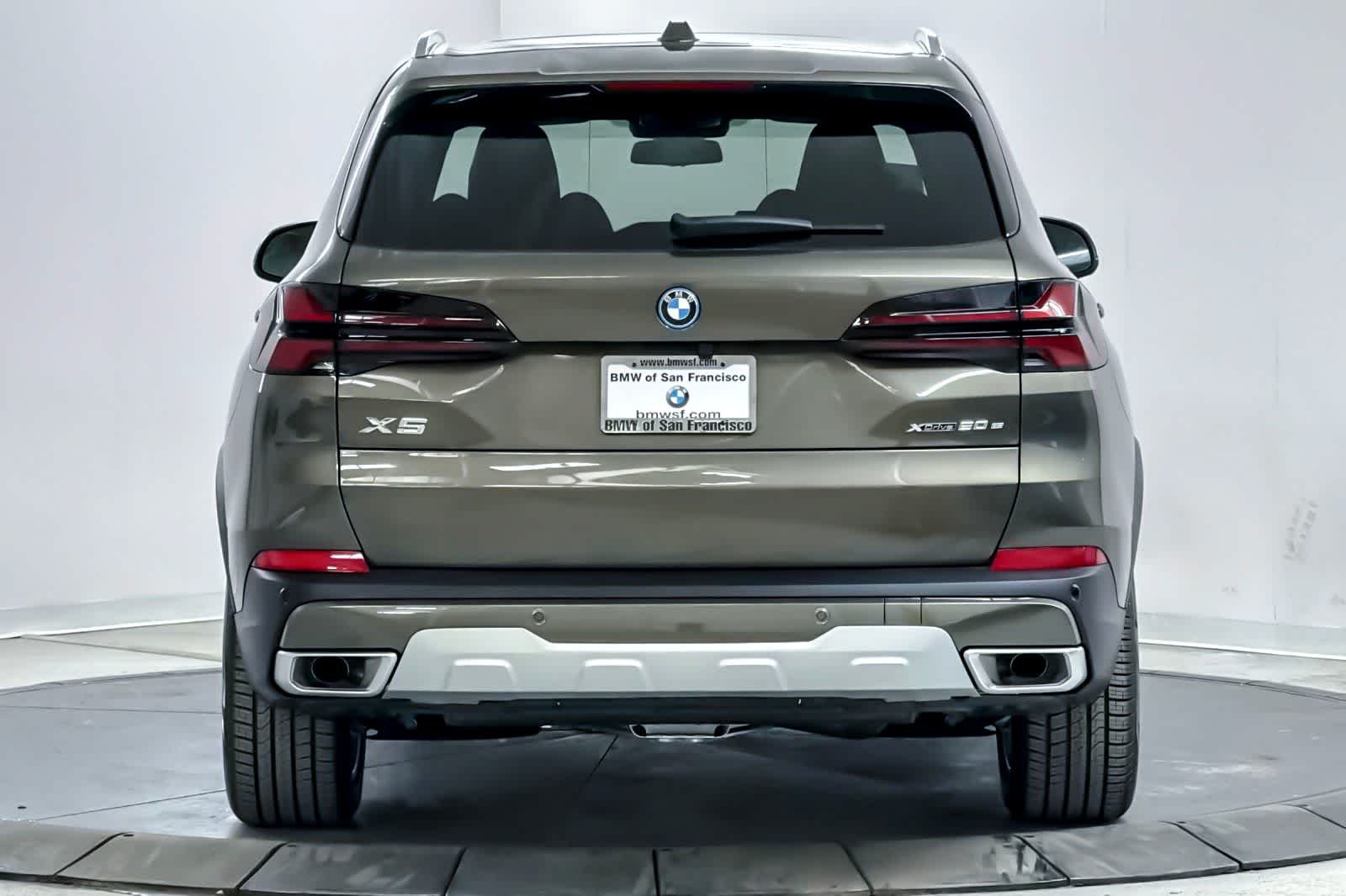 New 2026 Manhattan Green Metallic BMW xDrive50e image 7