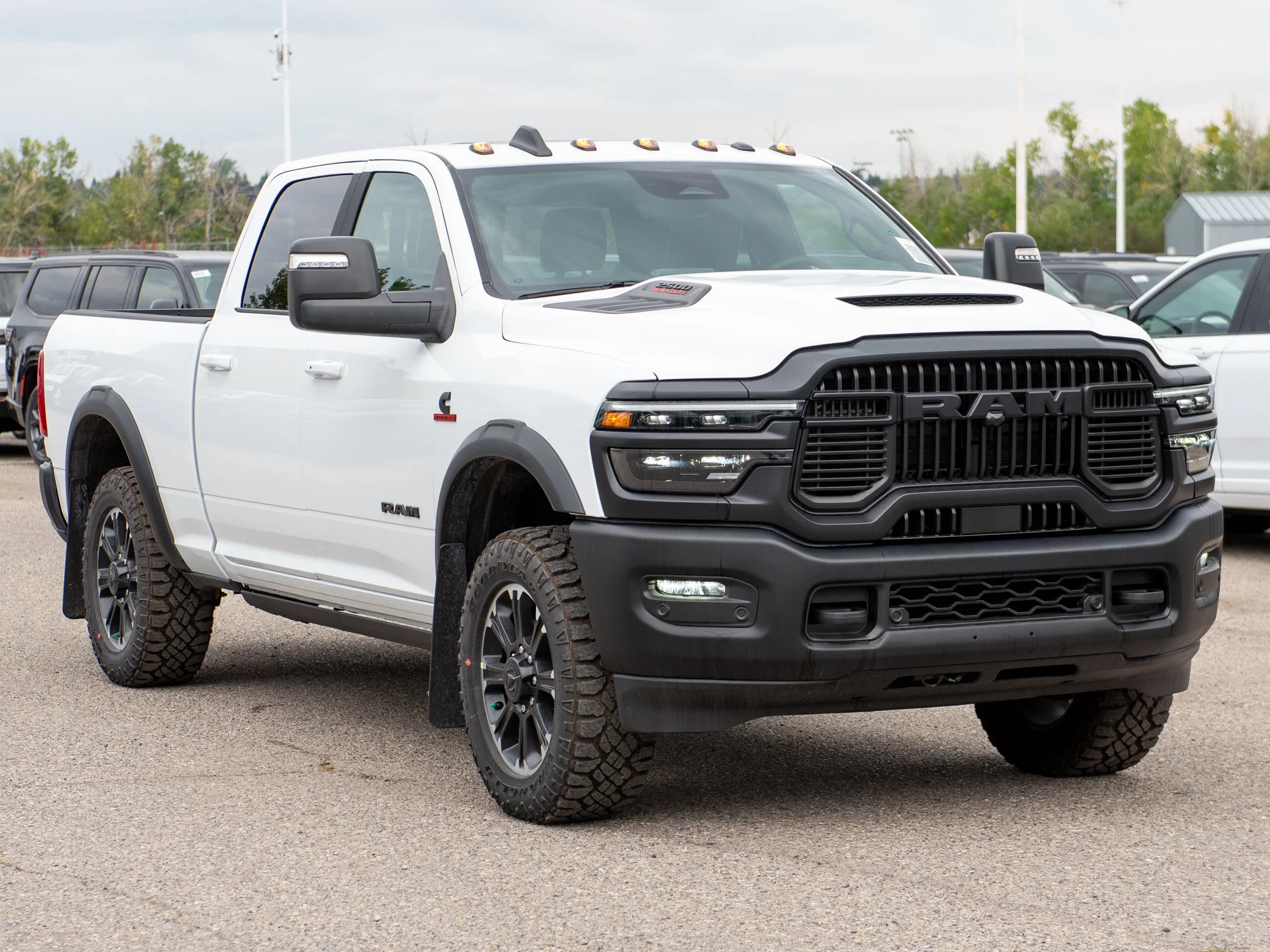 New 2026 White RAM Rebel* Crew Cab 4x4, 6.7L Cummins, Sunroof, 34 Inch A/T Tires, Passenger Screen image 10