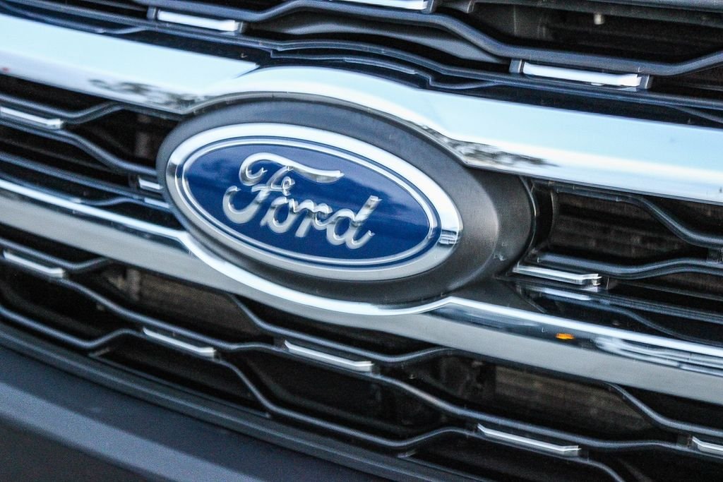 Used 2024 Black Metallic Ford Limited image 6