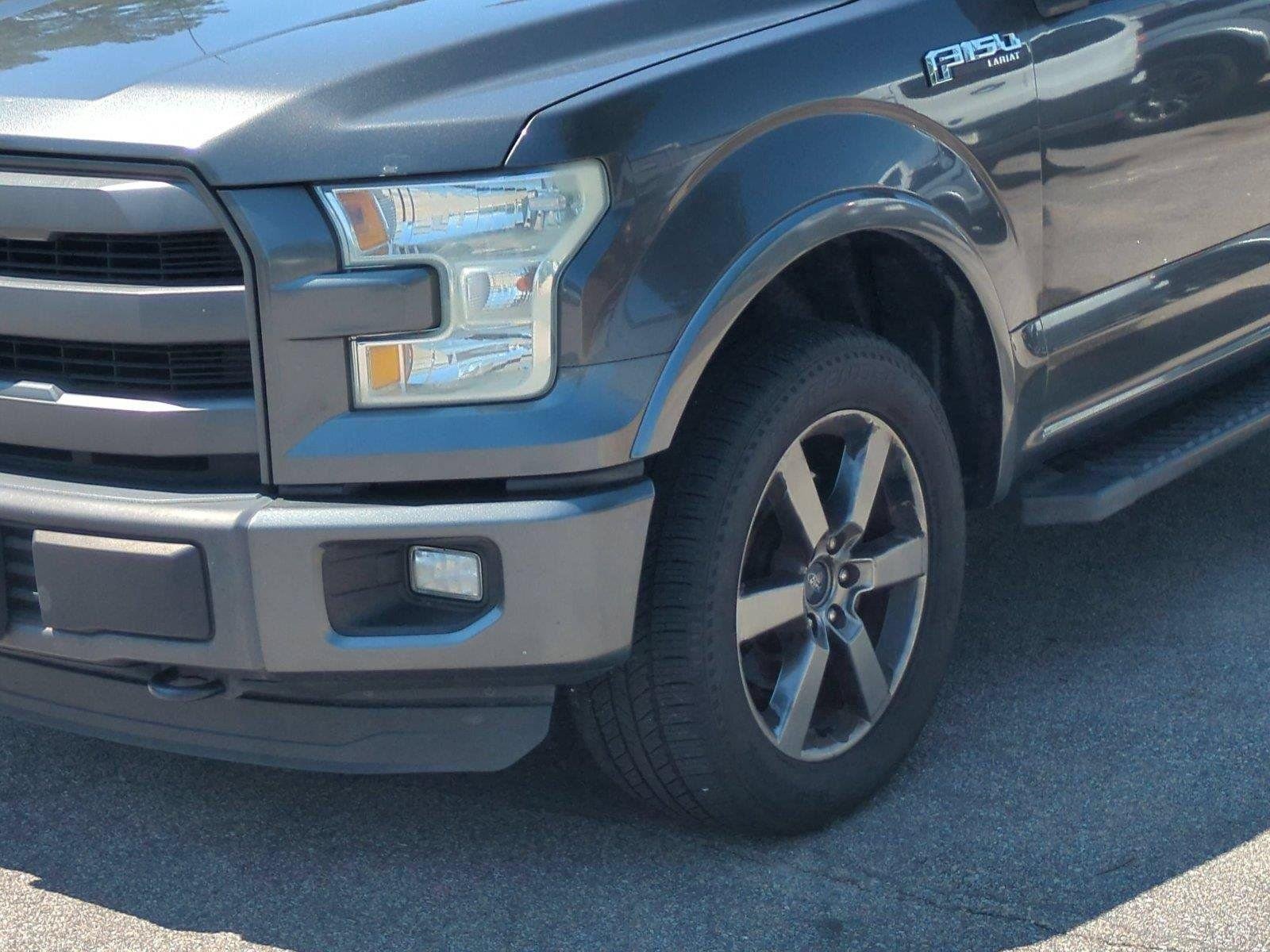 Used 2015 Magnetic Metallic Ford Lariat image 9
