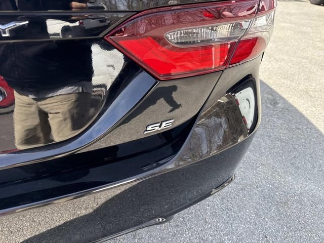 Used 2023 Midnight Black Metallic Toyota SE image 7