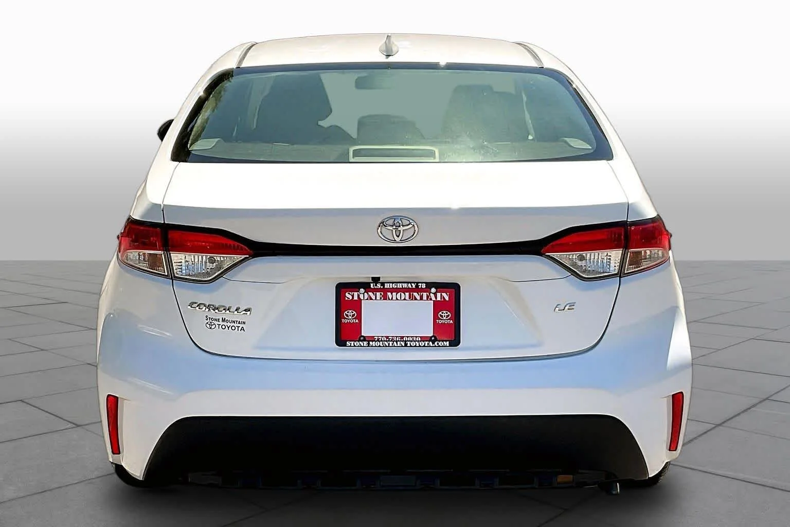 Used 2021 Super White Toyota LE image 5