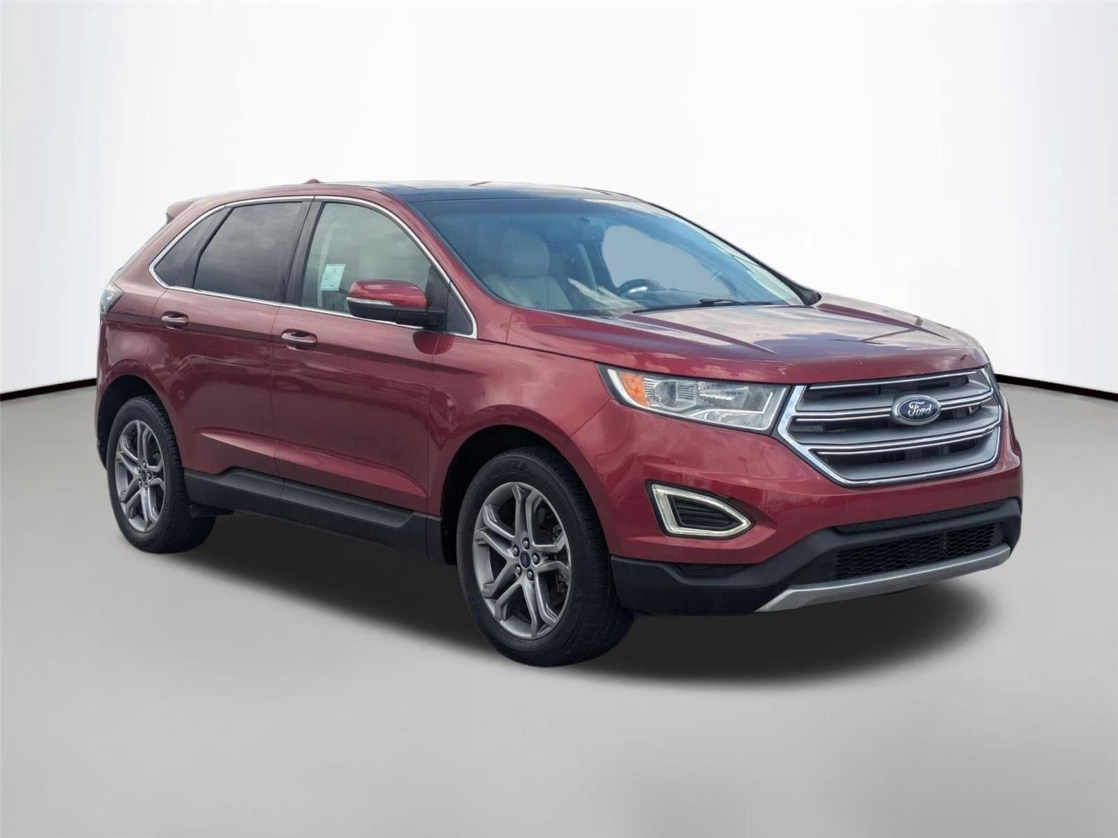 Used 2016 Ruby Red Metallic Tinted Clearcoat Ford Titanium image 3