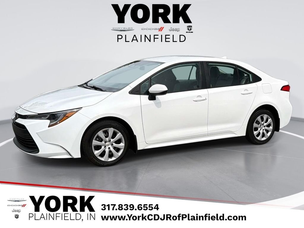 Used 2025 White Toyota LE image 1