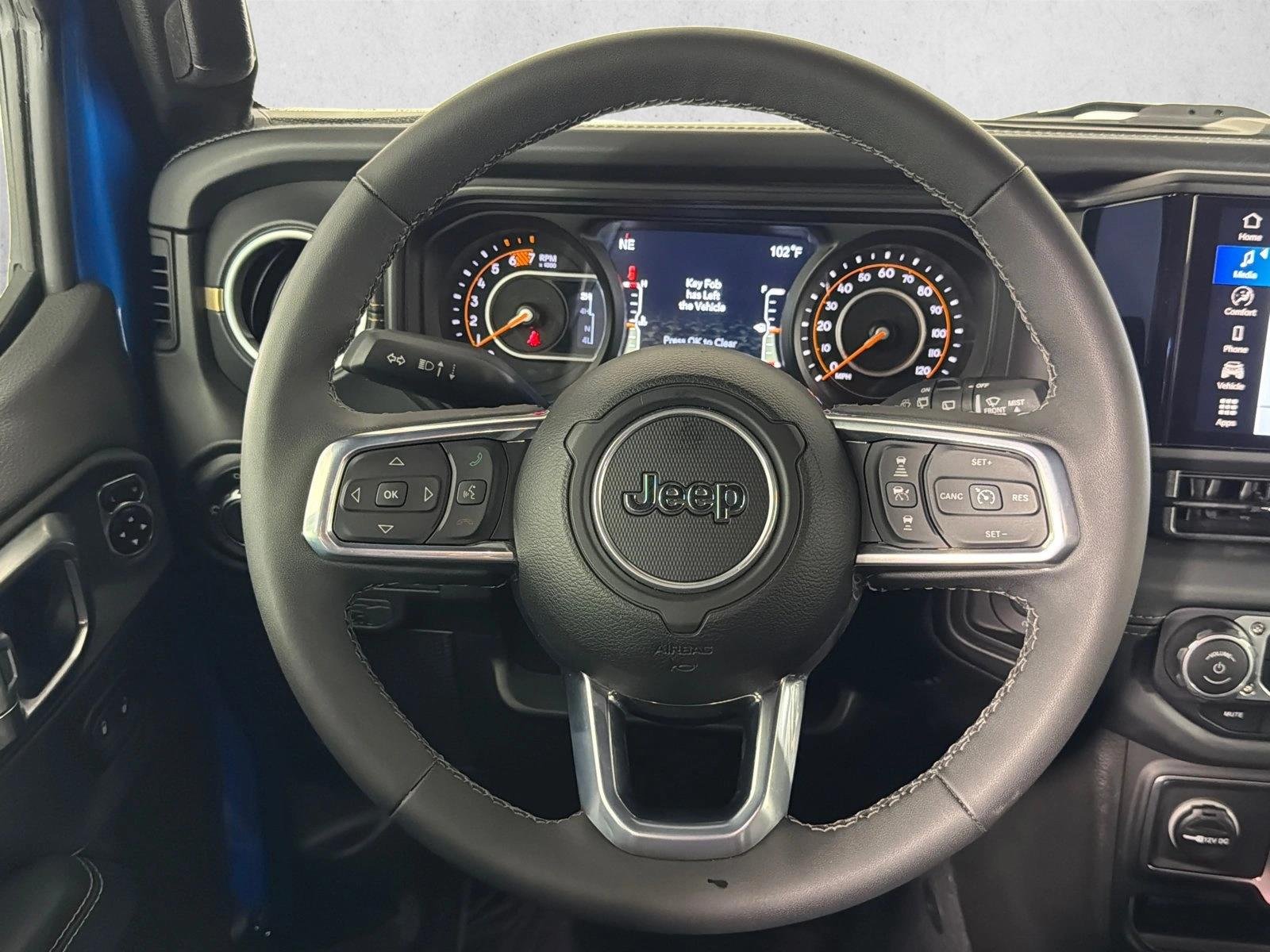 Used 2025 Hydro Blue Pearlcoat Jeep Sahara image 24