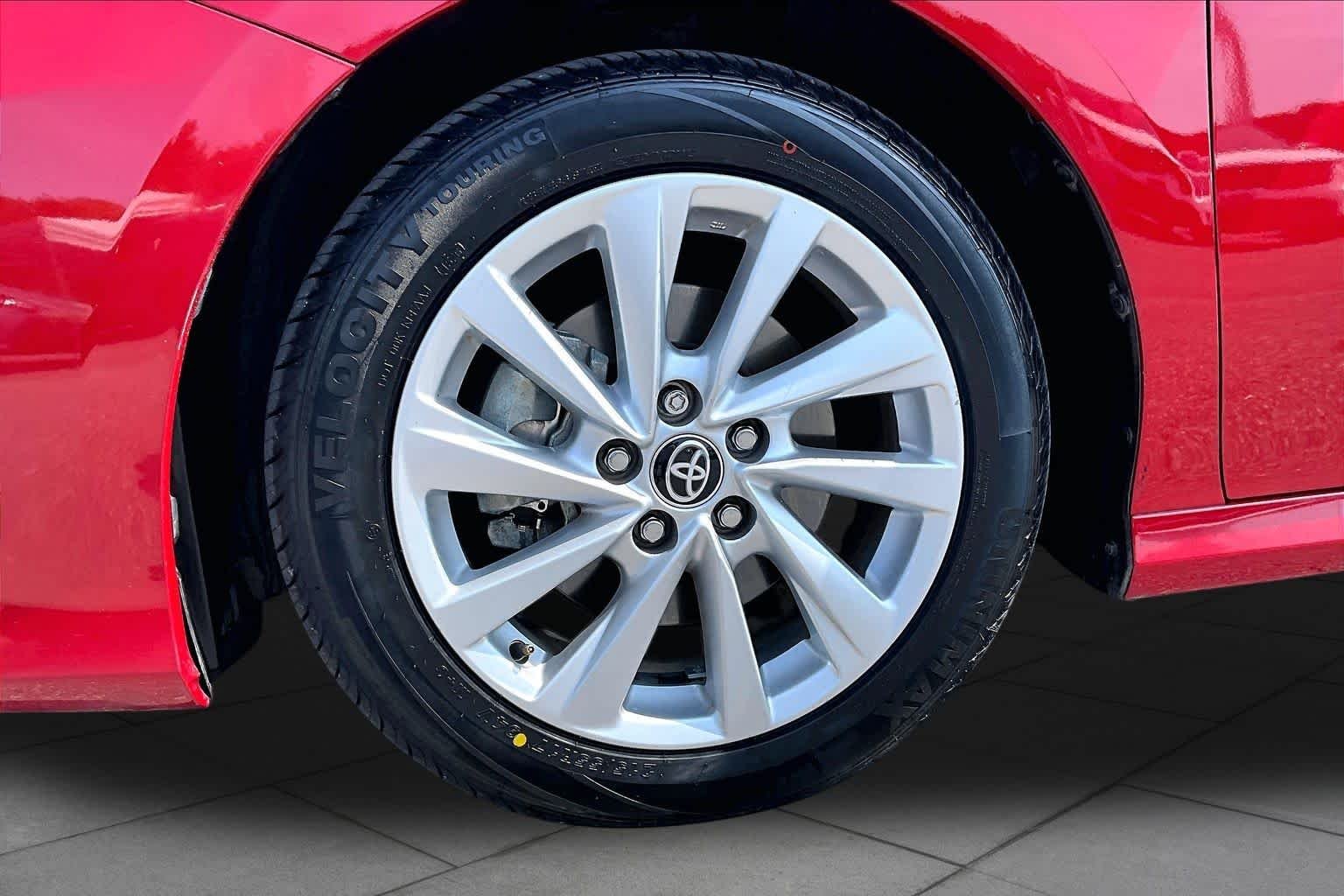 Used 2023 Supersonic Red Toyota LE image 11