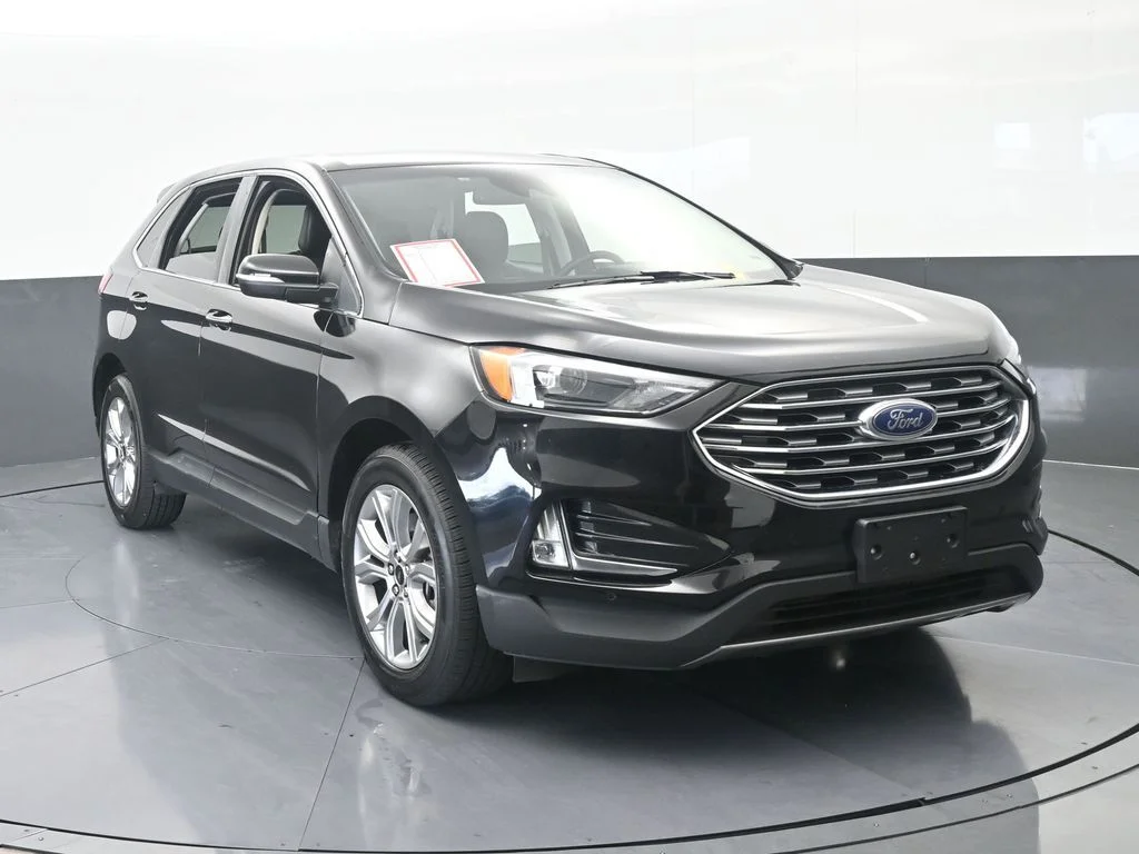 Used 2024 Black Metallic Ford Titanium image 9