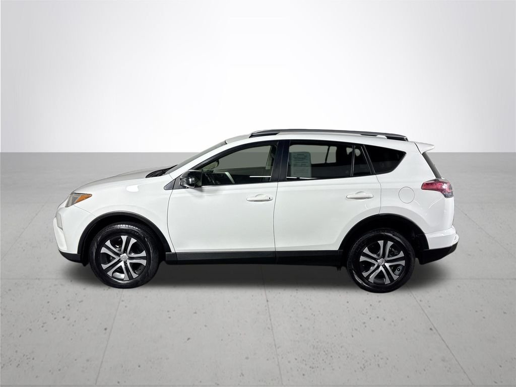 Used 2016 Super White Toyota LE image 9