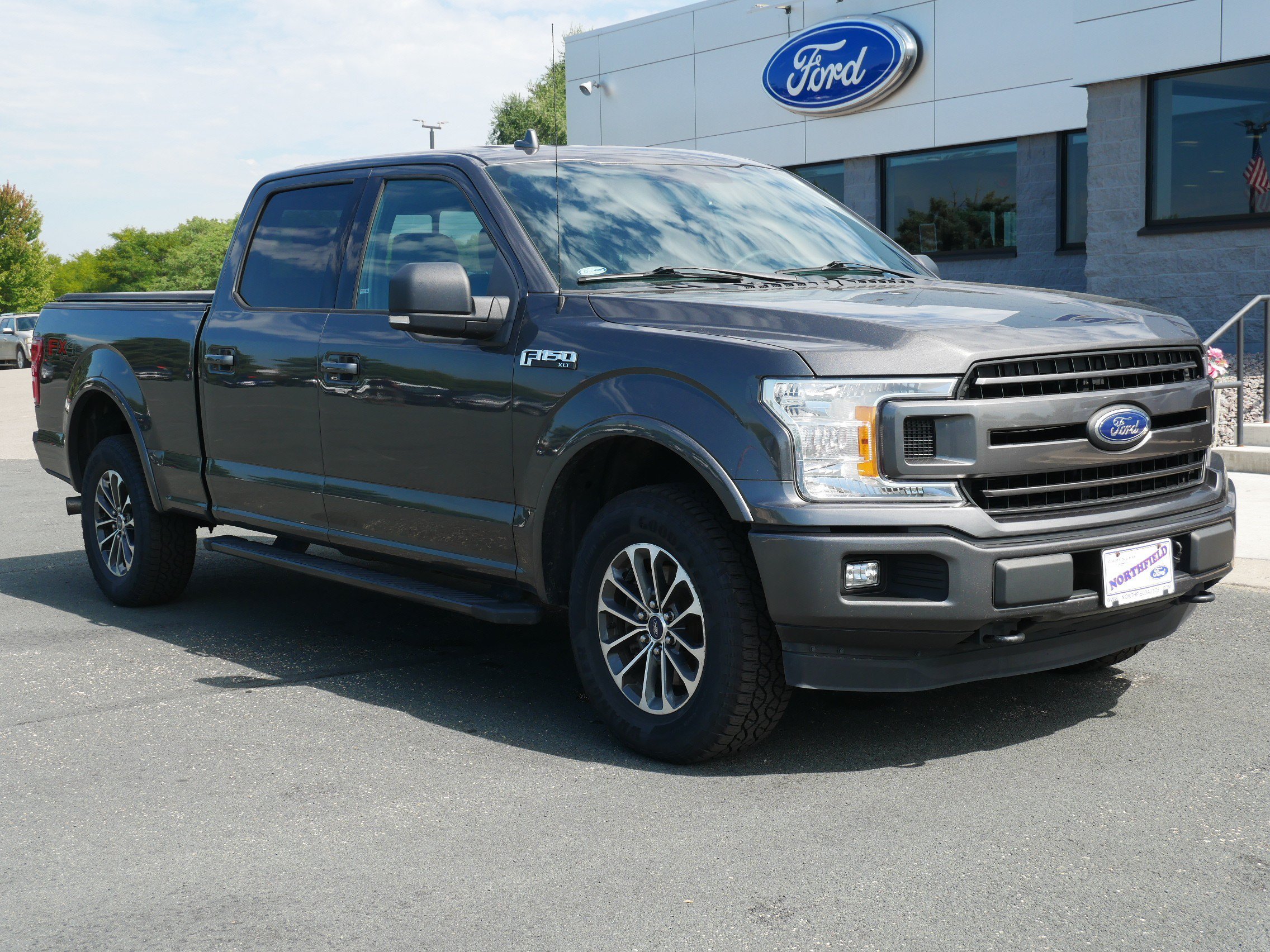 Used 2018 Ford F-150 XLT with VIN 1FTFW1E51JKE12727 for sale in Northfield, Minnesota