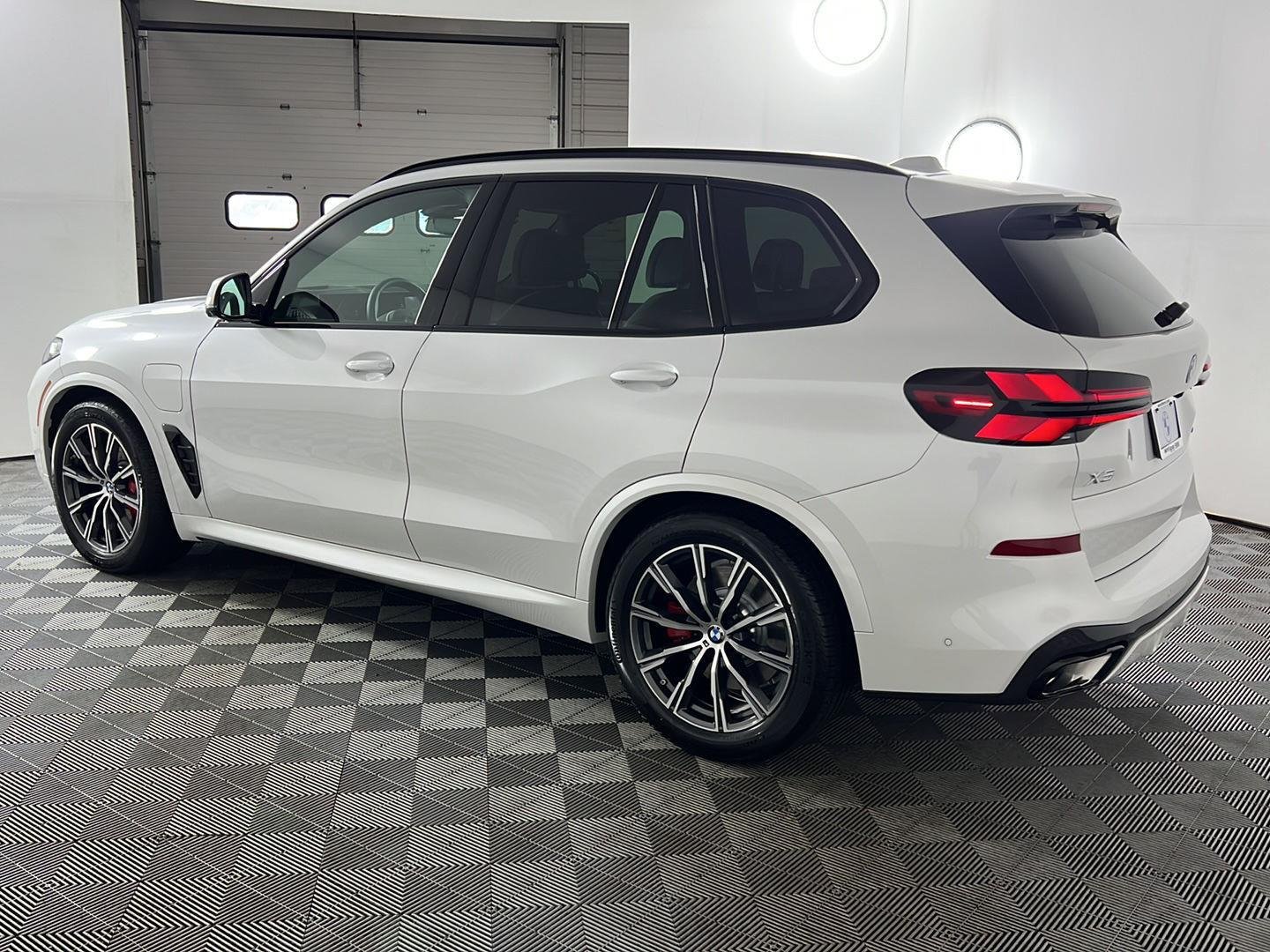 Used 2026 Mineral White Metallic BMW xDrive50e image 9