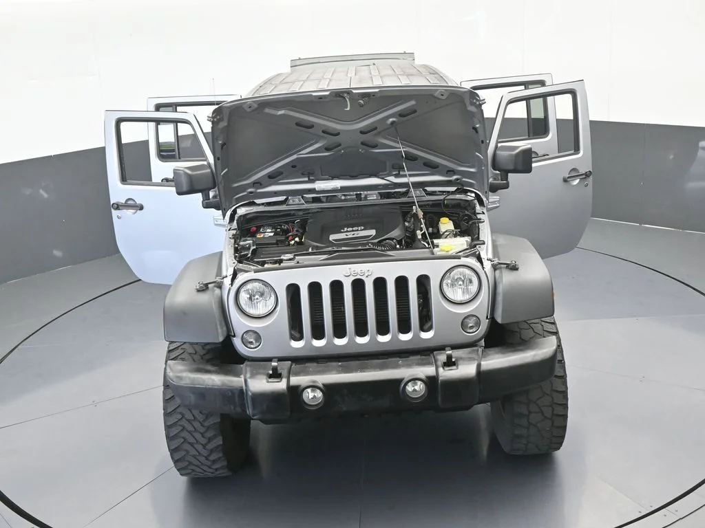 Used 2016 Billet Silver Metallic Clearcoat Jeep Unlimited Sport image 62