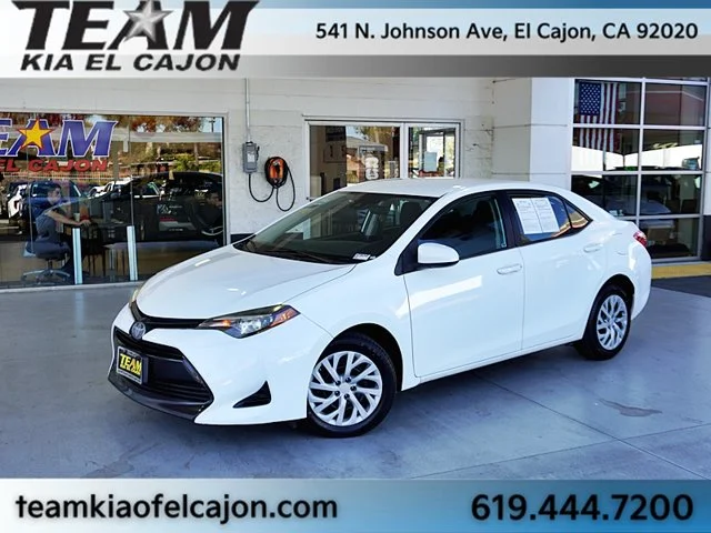 Used 2019 White Toyota LE image 1