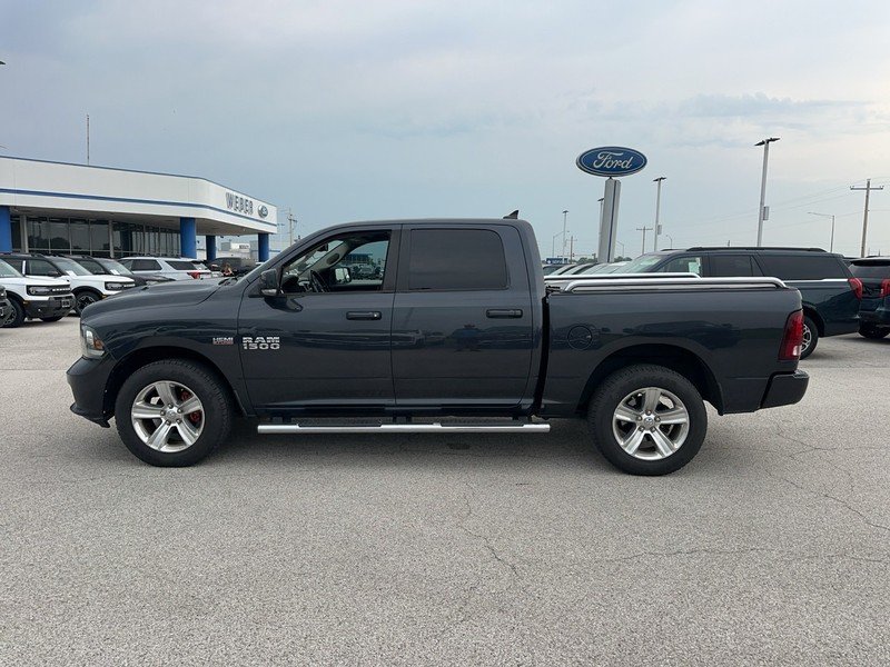 Used 2016 Granite Crystal Metallic Clearcoat Ram 4WD Crew Cab 140.5" Sport image 2
