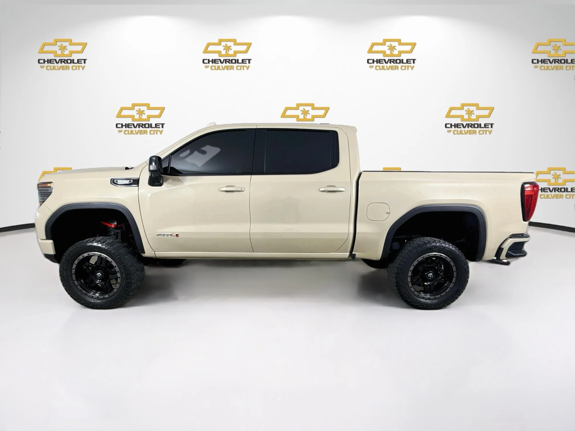 Used 2023 DESERT SAND METALLIC GMC AT4 image 5