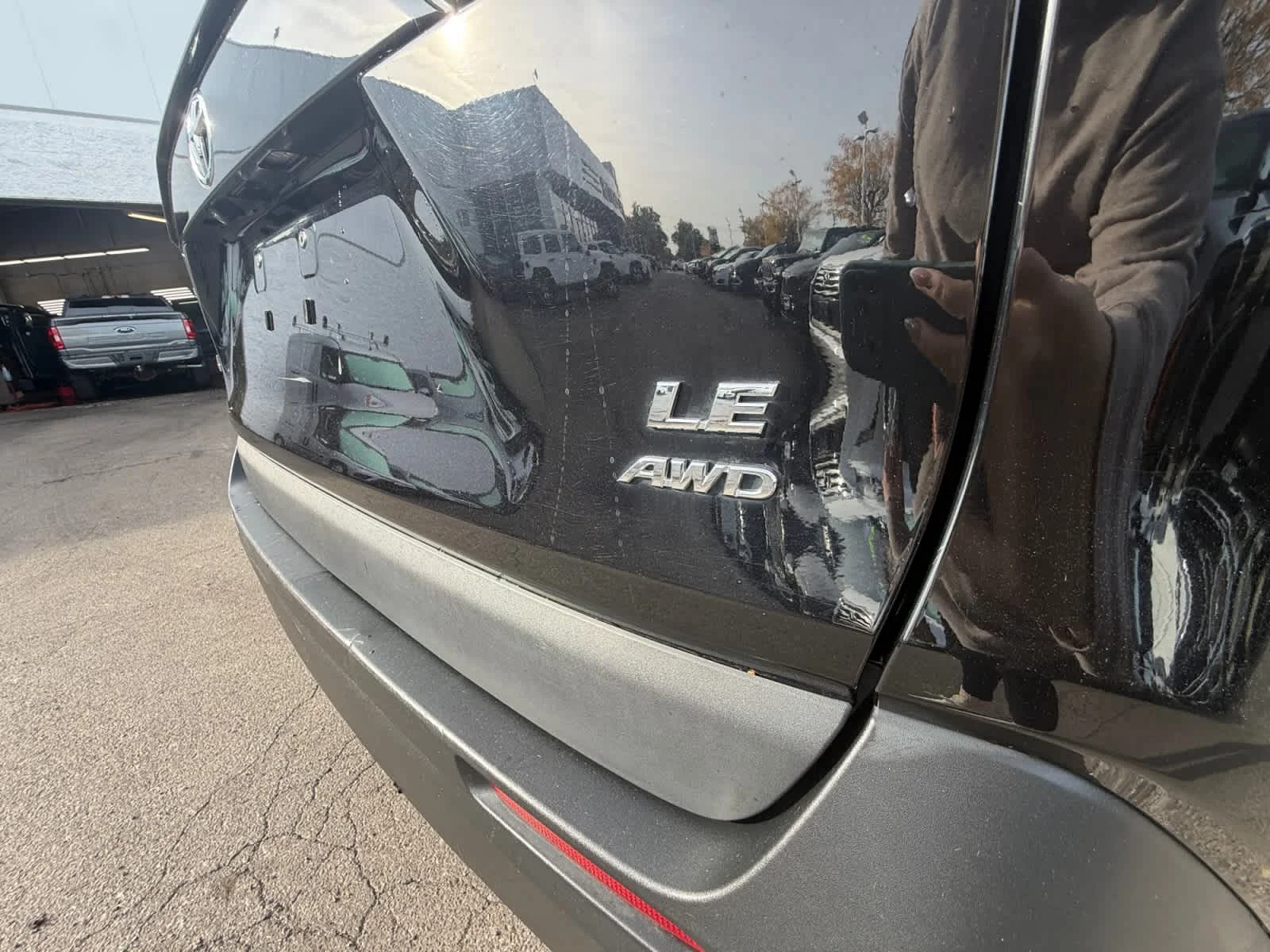 Used 2021 Midnight Black Metallic Toyota LE image 29