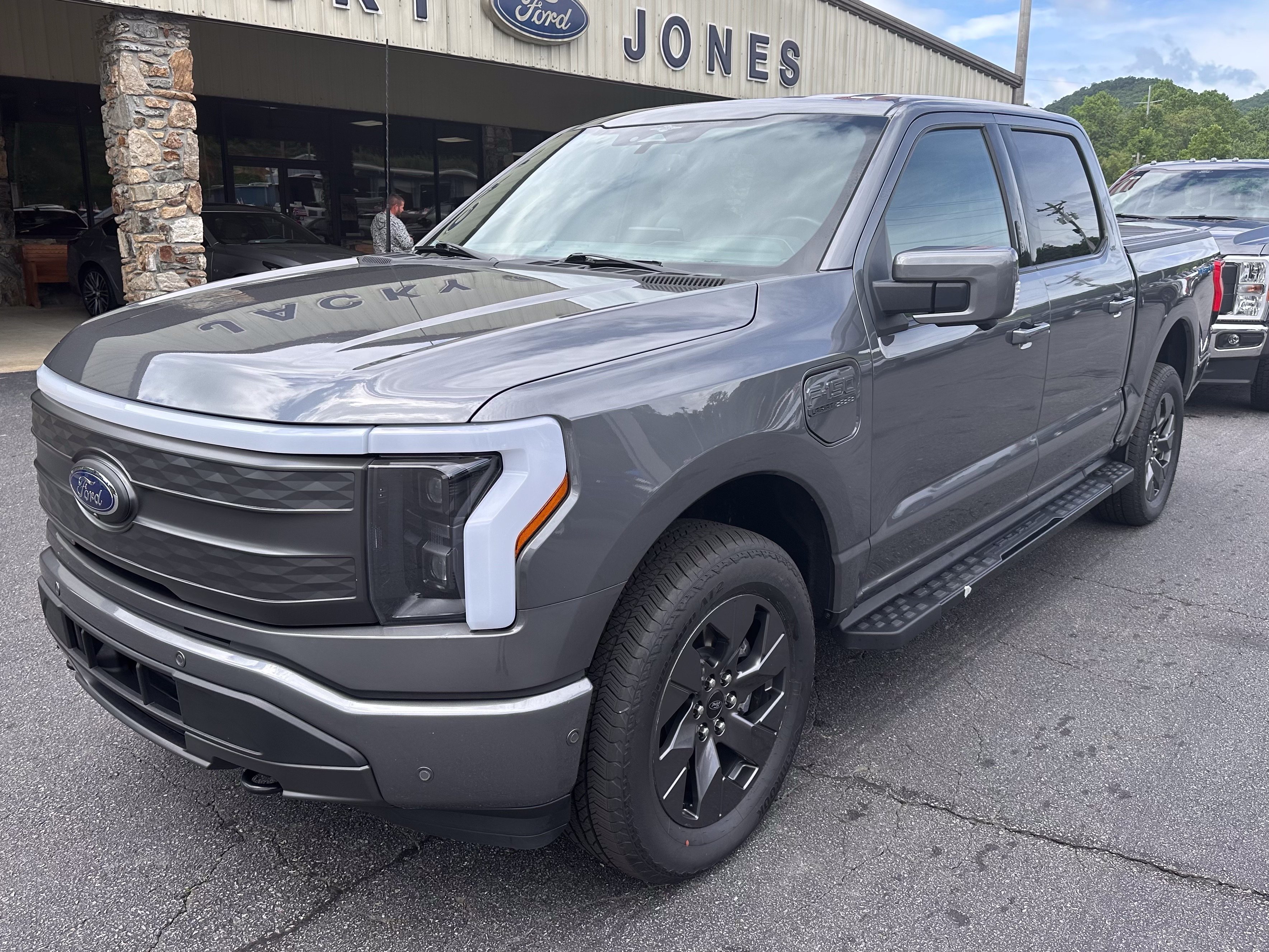 Used 2023 Carbonized Gray Metallic Ford LARIAT image 2