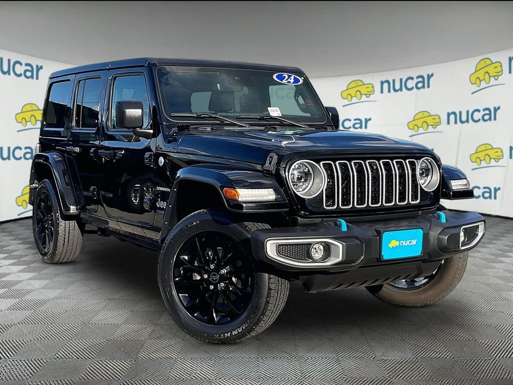 Used 2024 Black Jeep Sahara 4xe image 1
