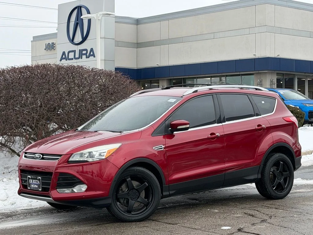 Used 2013 Red Ford Titanium image 1