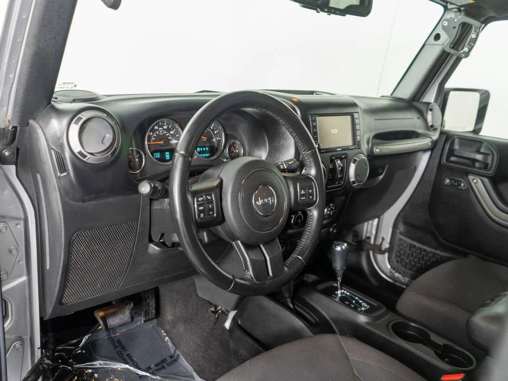 Used 2017 Silver Jeep Unlimited Sport image 13