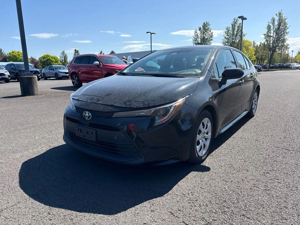 Used 2024 Midnight Black Metallic Toyota LE image 3