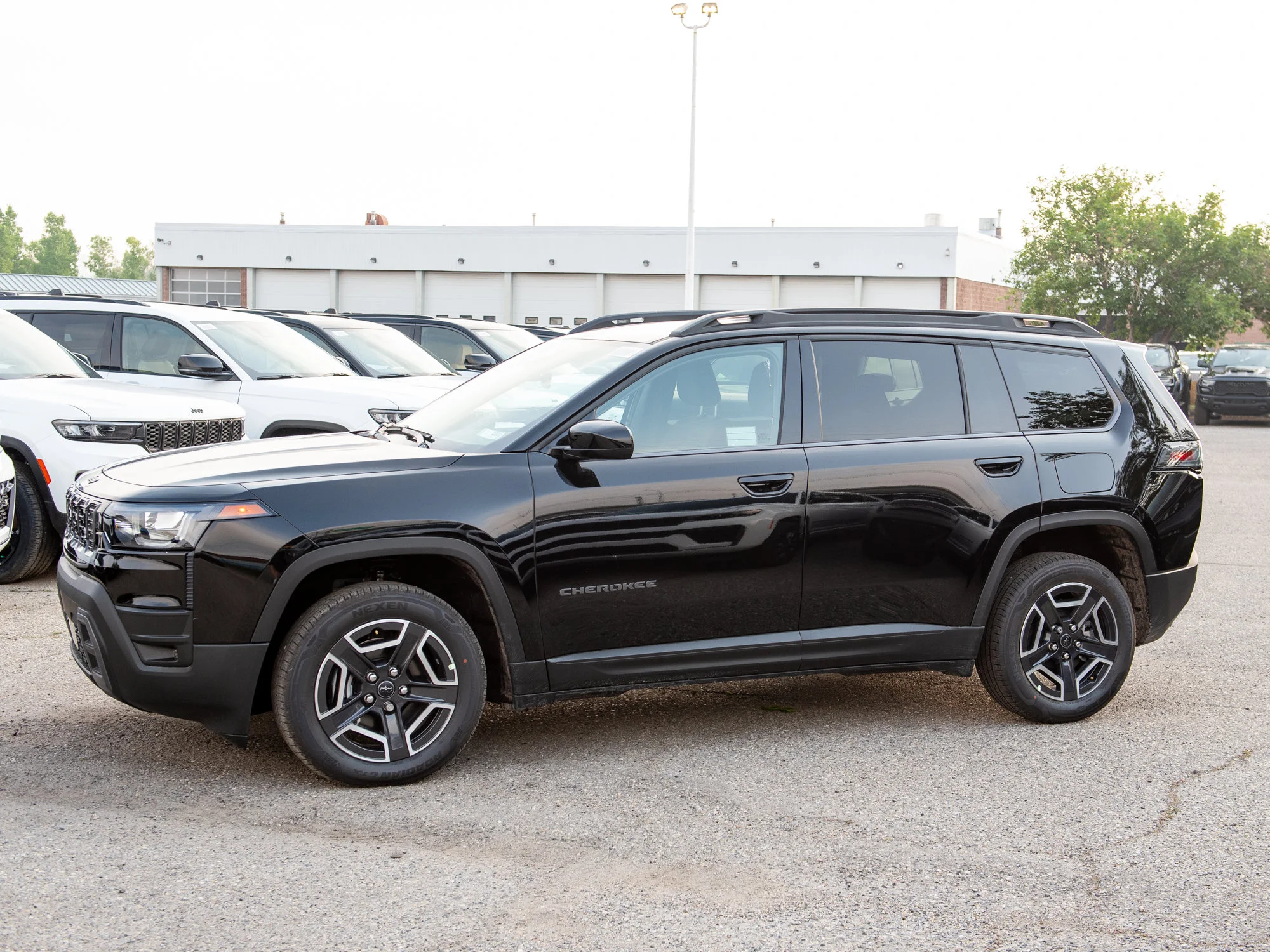 New 2026 Black Jeep Laredo * Hybrid image 3