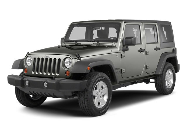 Used 2013 Bright White Jeep Sahara image 1