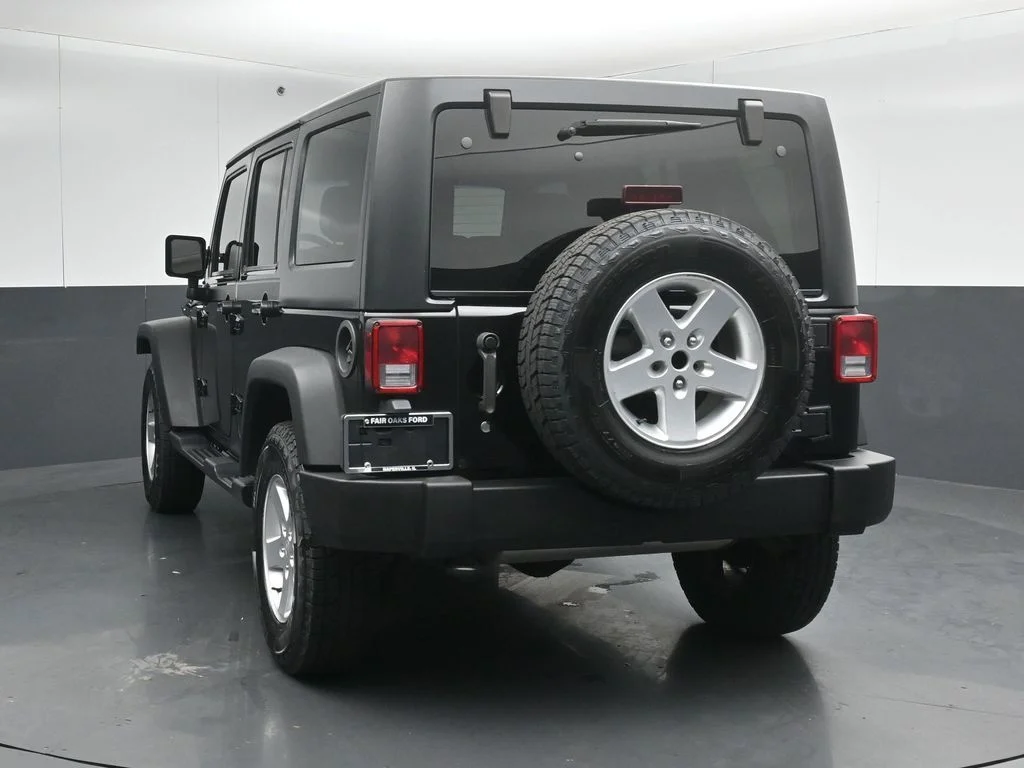 Used 2015 Black Jeep Unlimited Sport image 6