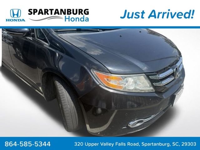 Used 2016 Crystal Black Pearl Honda Touring Elite image 1