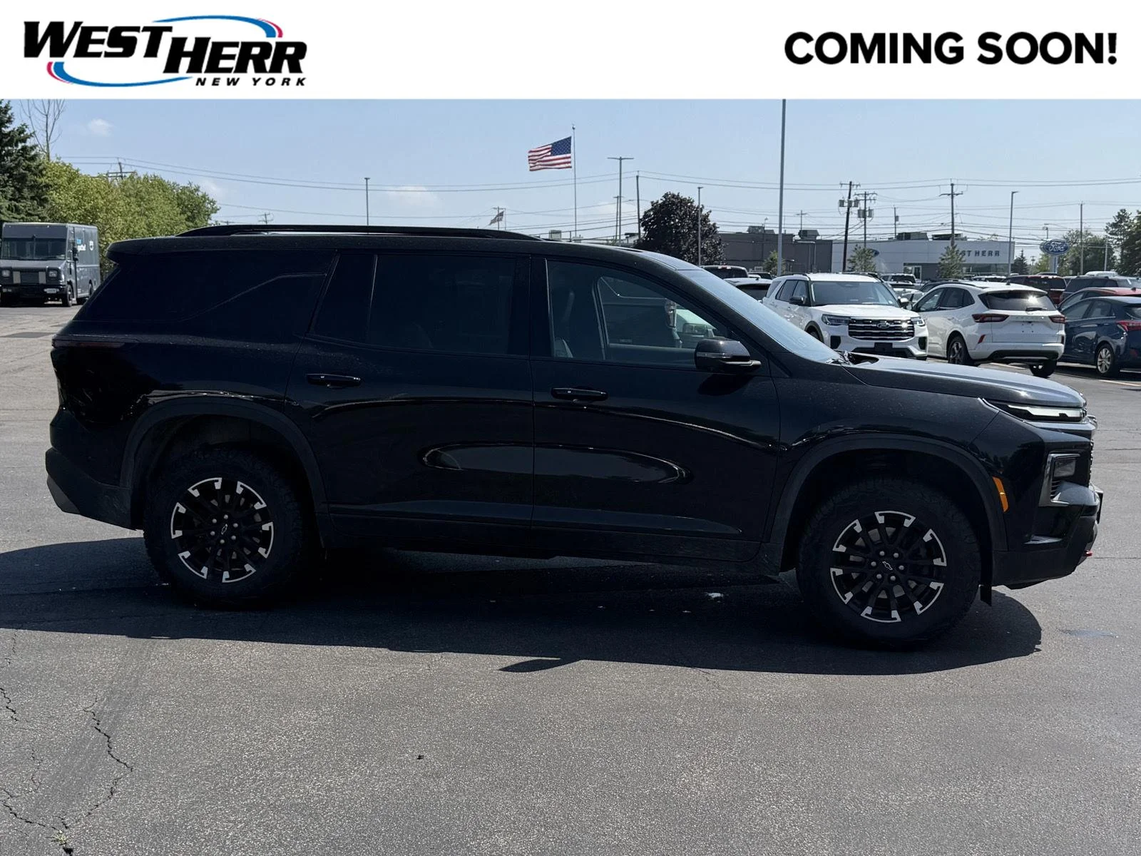 Used 2024 Mosaic Black Metallic Chevrolet AWD Z71 image 1