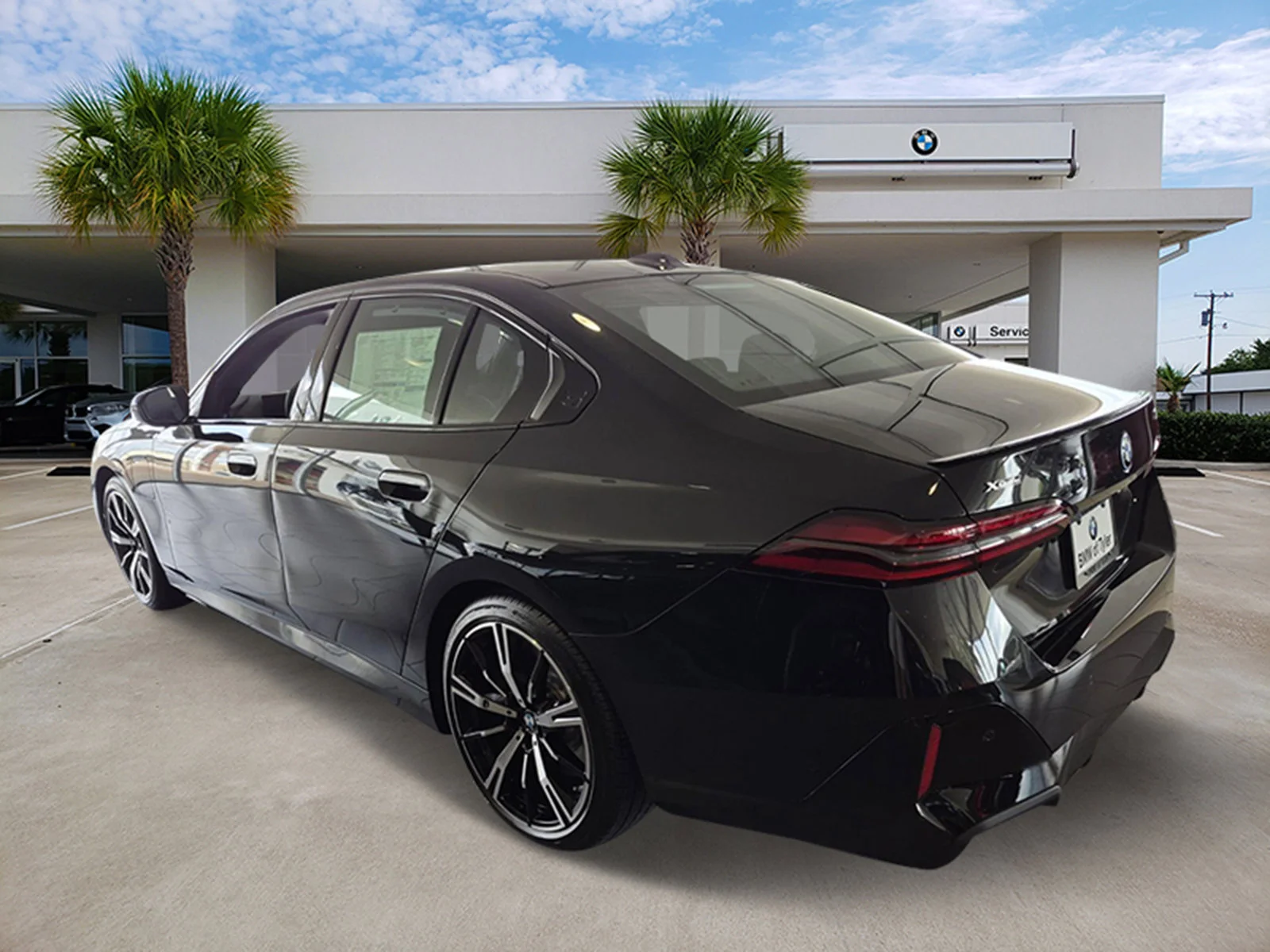 New 2027 Black Sapphire Metallic BMW 550e xDrive image 6