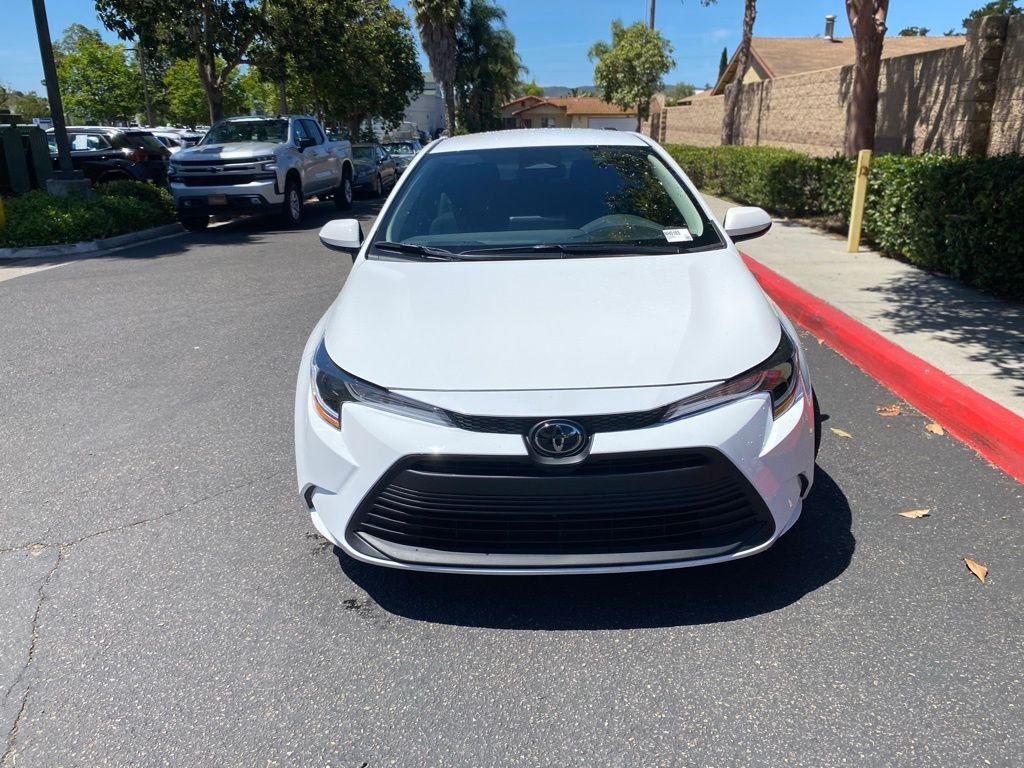 Used 2025 White Toyota LE image 2