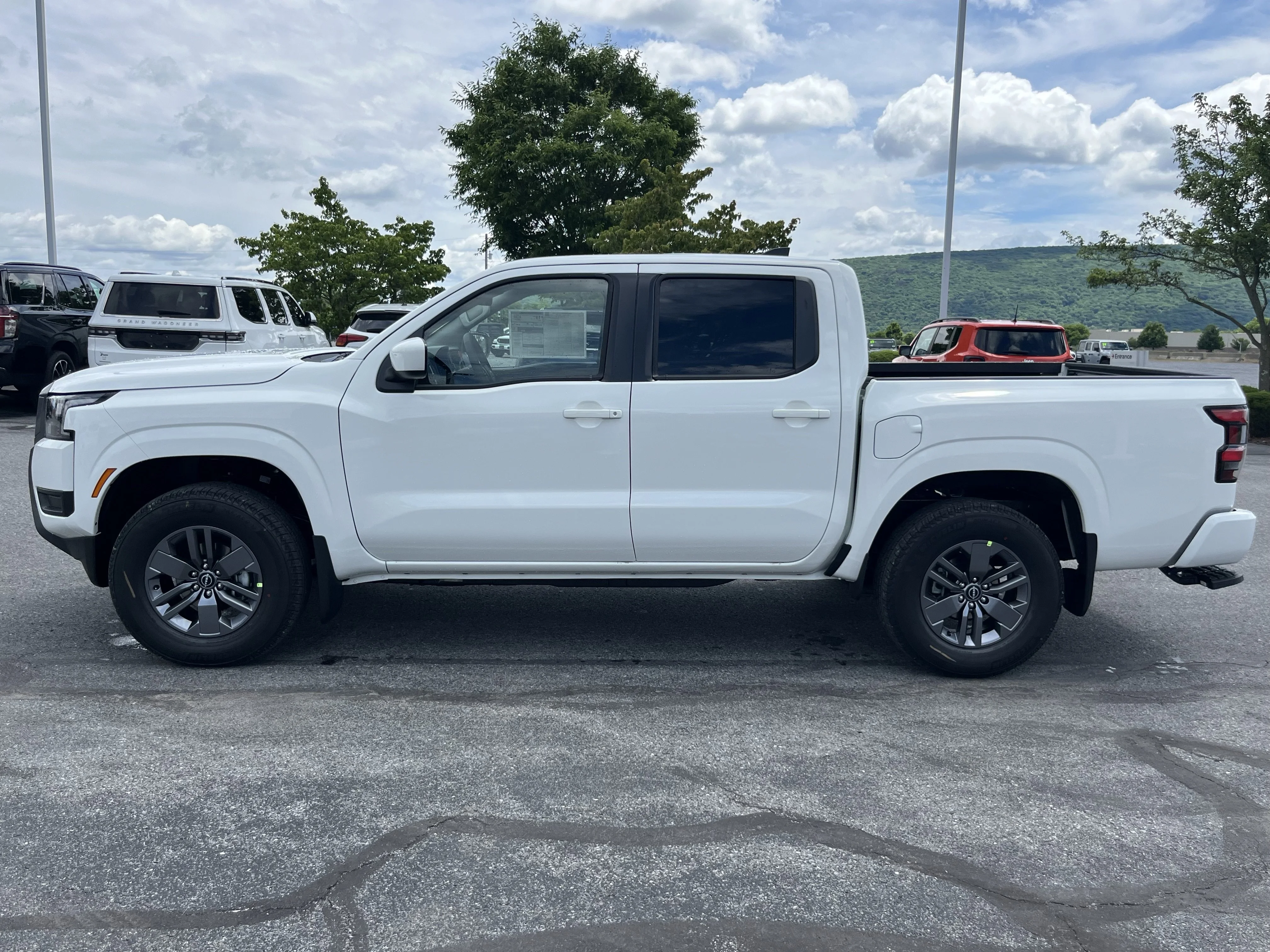 New 2026 Glacier White Nissan Crew Cab SV image 9