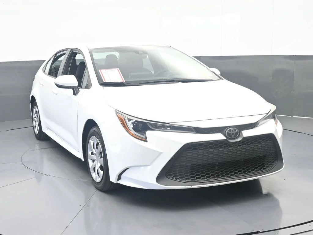 Used 2021 Super White Toyota LE image 8