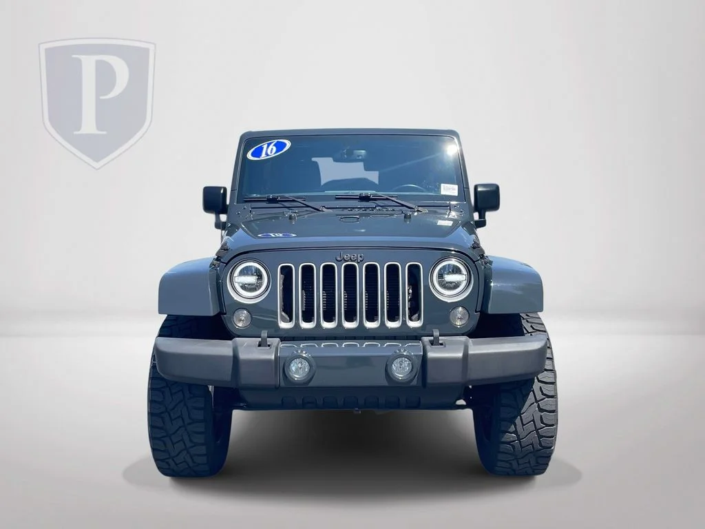 Used 2016 Black Jeep Unlimited Sahara image 3