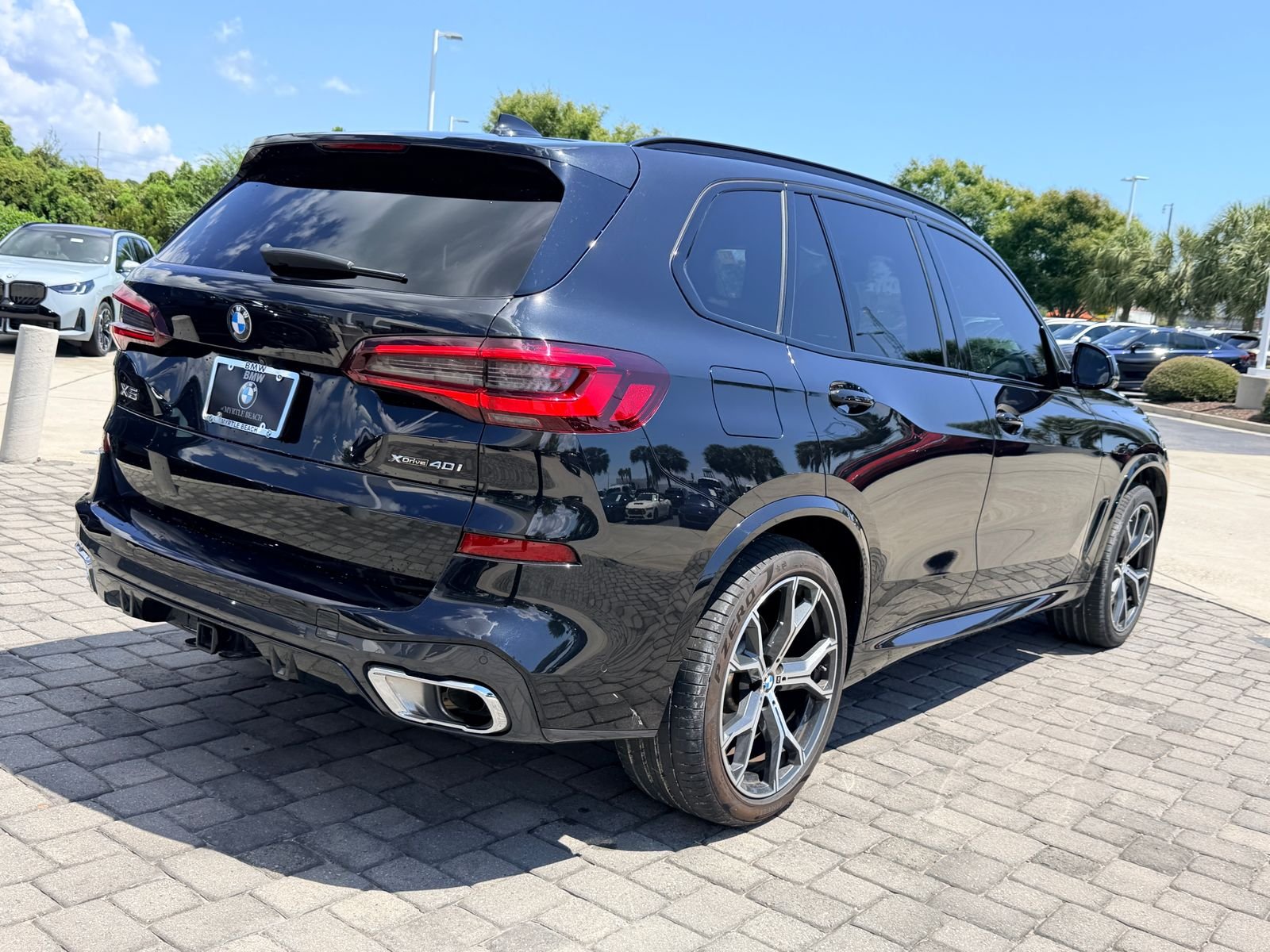 Certified Used 2023 Black Sapphire Metallic BMW xDrive40i image 8