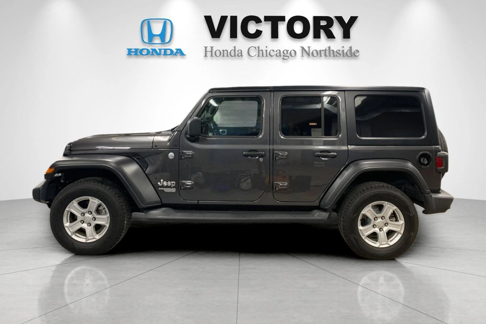 Used 2021 Crystal Metallic Jeep Unlimited Sport S image 6
