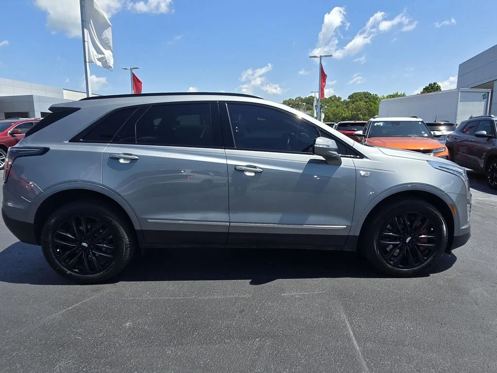 Used 2023 Argent Silver Metallic Cadillac AWD Sport image 4