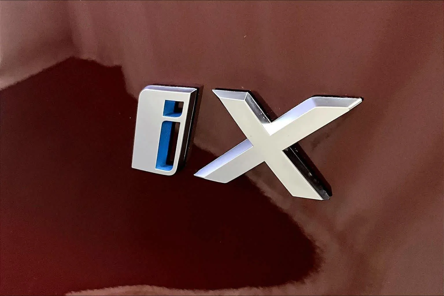 Used 2024 Aventurin Red Metallic BMW xDrive50 image 9