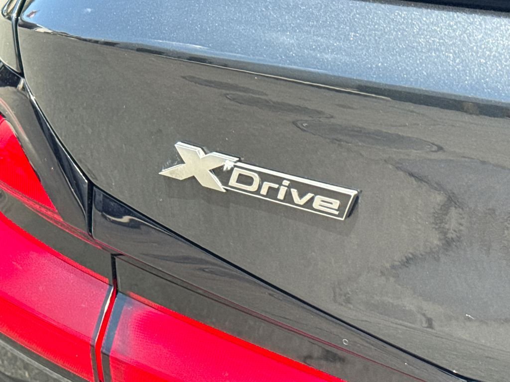Used 2023 Black BMW M550i xDrive image 10