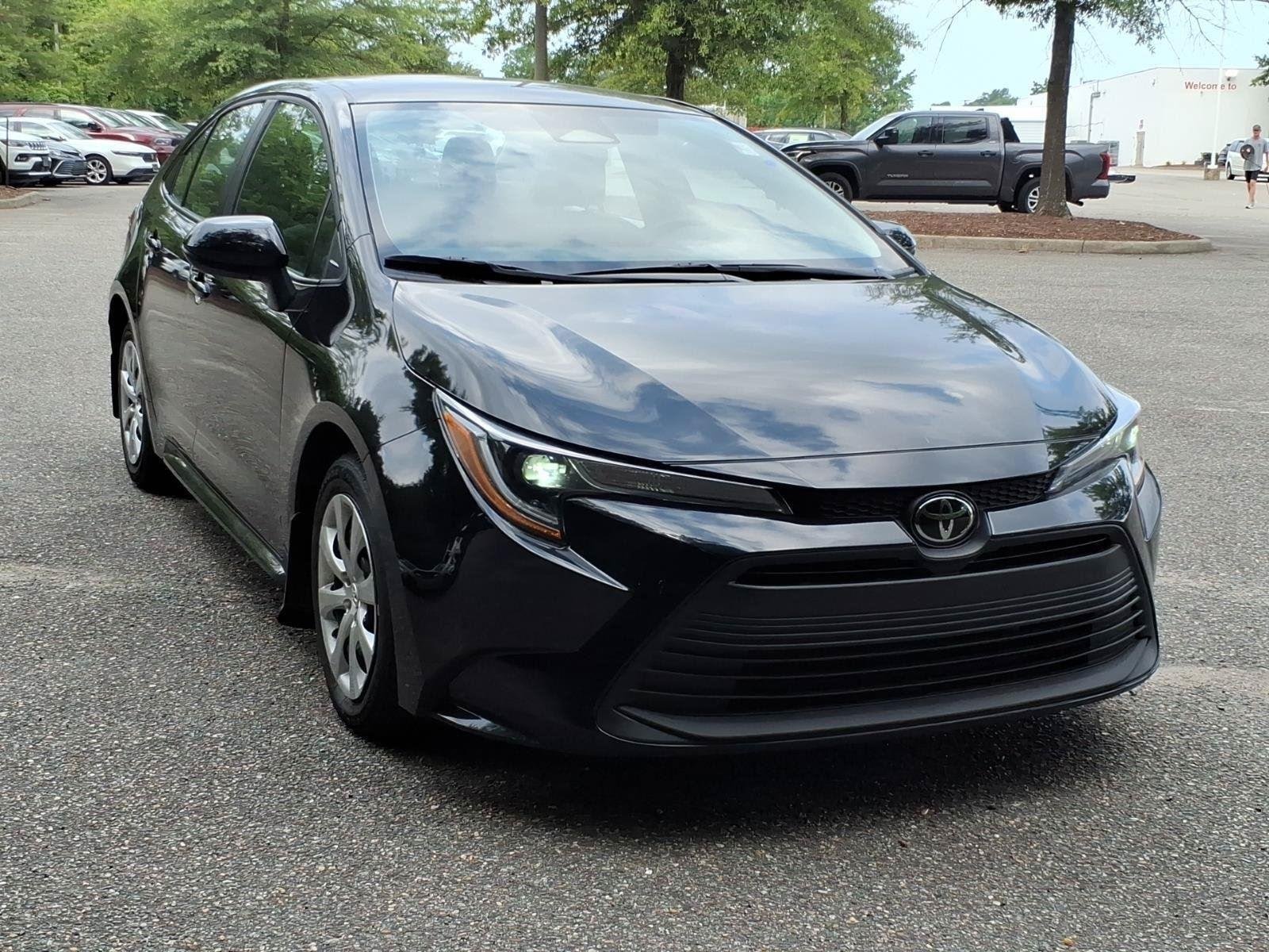 Used 2025 Midnight Black Metallic Toyota LE image 6