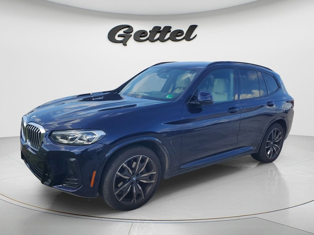 Used 2022 Blue BMW sDrive30i image 1