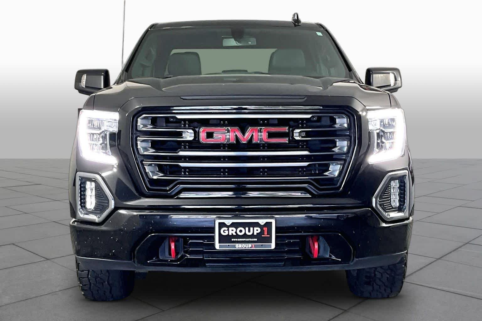 Used 2021 EBONY TWILIGHT METALLIC GMC AT4 image 4