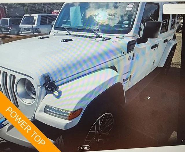 Used 2023 White Jeep Sahara 4xe image 1